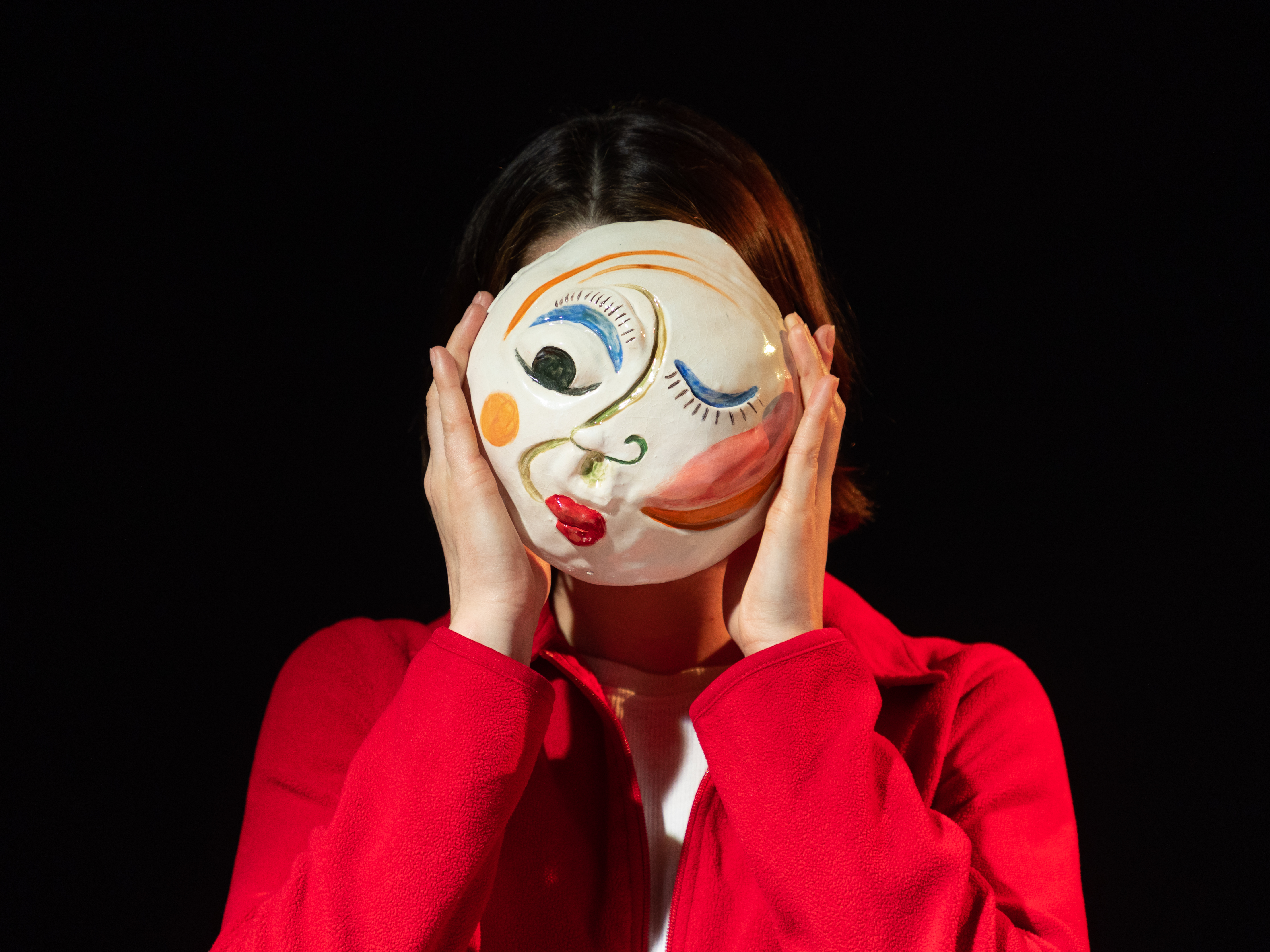 Photo of I'm Fine. participant holding their mask