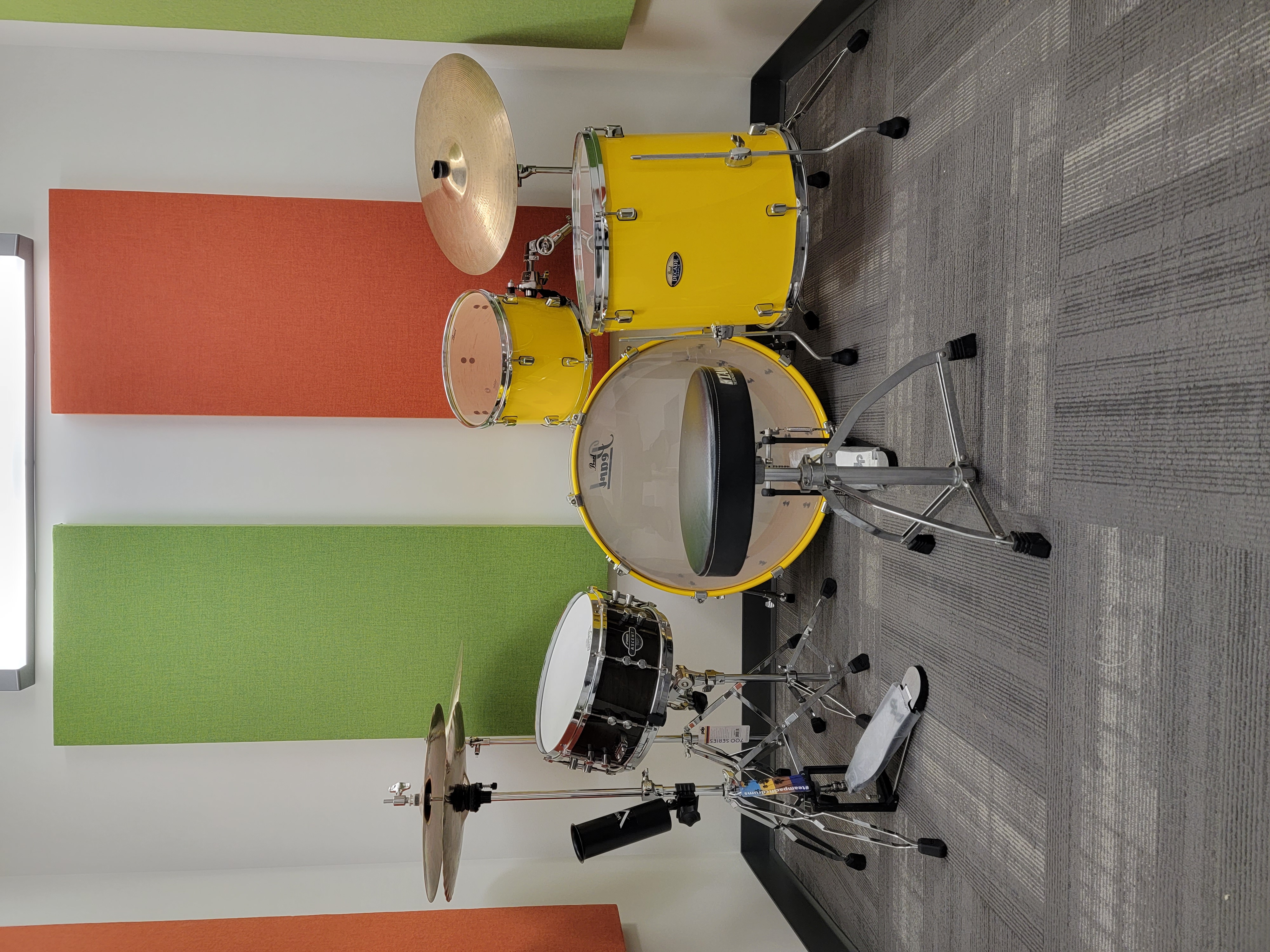 music practice room with yellow drum kit
