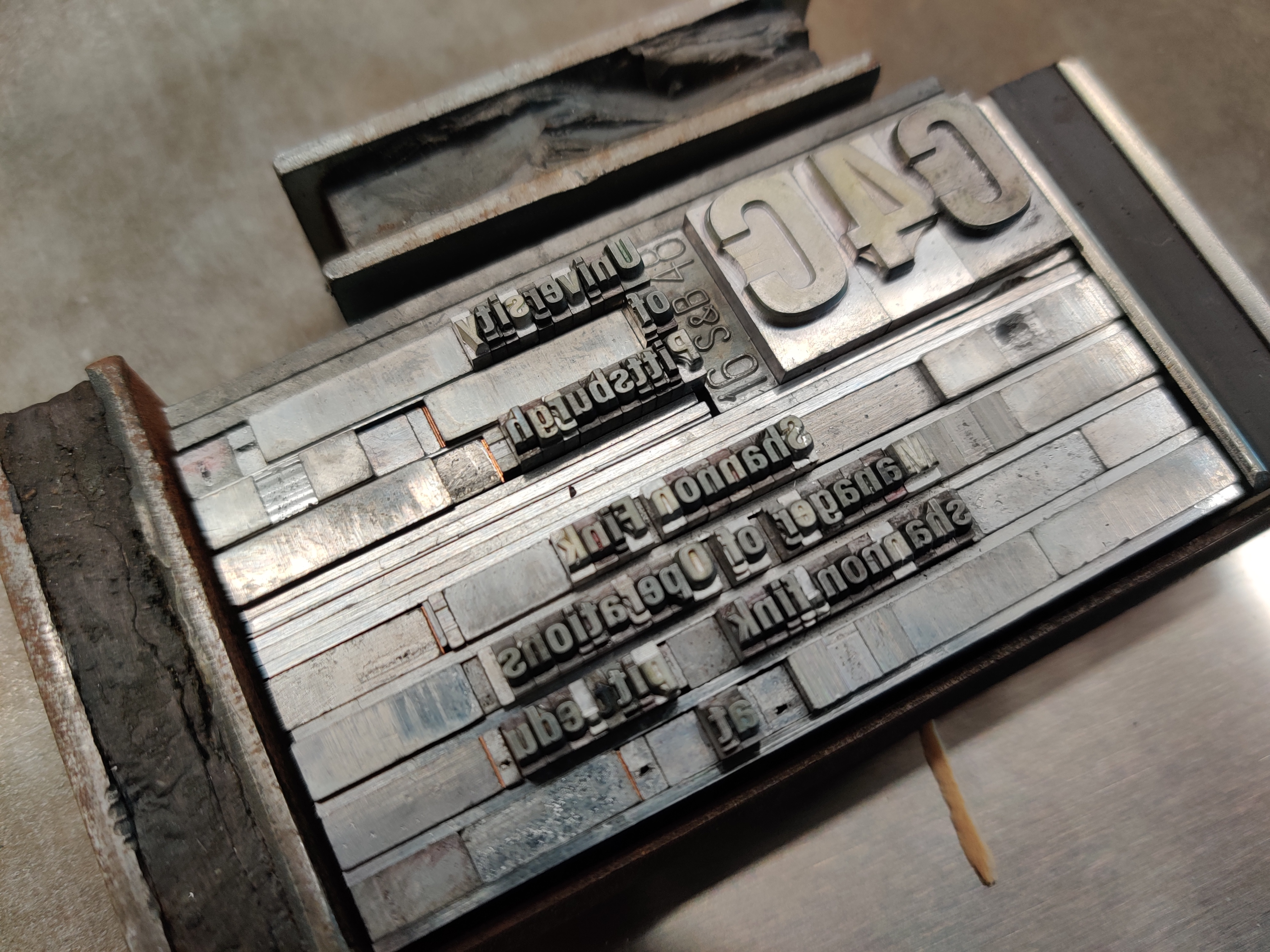 metal typeface set in a business card design